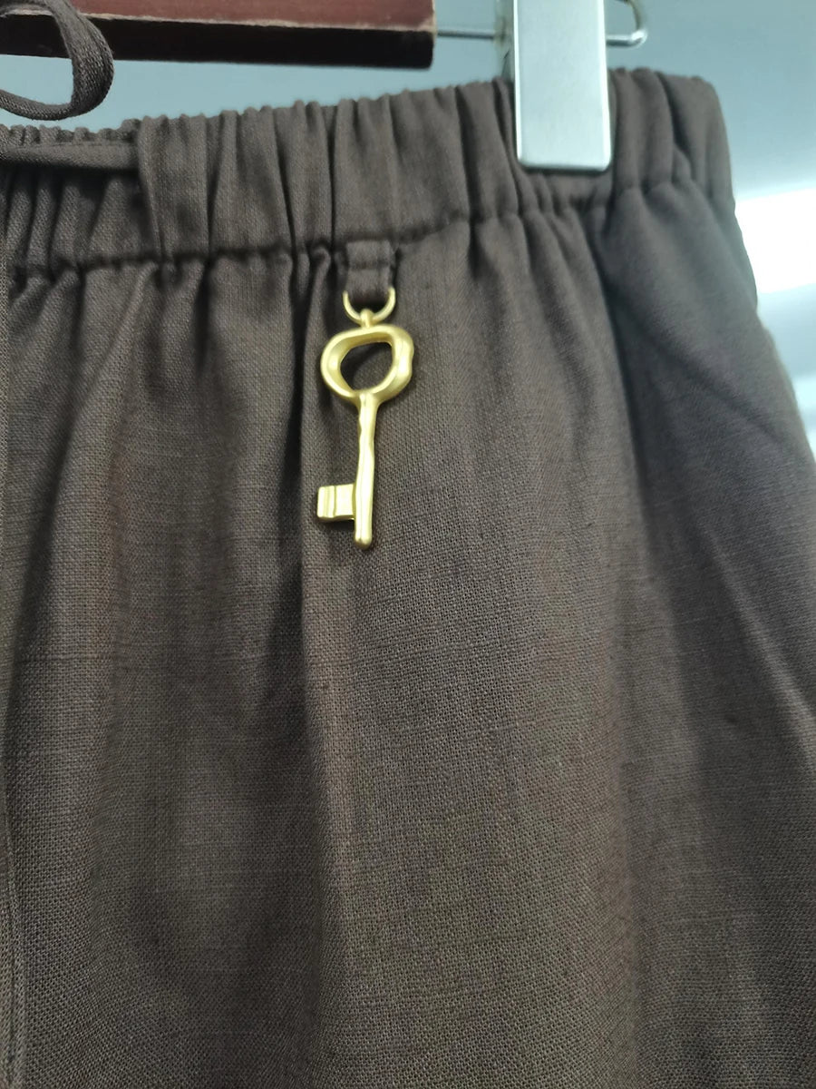 VGH Chic Spliced Metal Buckles Two Piece Set for Women Lapel Long Sleeve Top High Waist Patchwork Drawstring Pants Suit Female