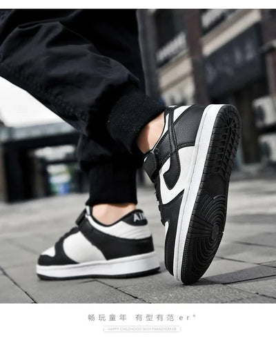 Boys' sports shoes 2025 new leather-covered waterproof children's casual shoes primary school trend non-slip board shoes