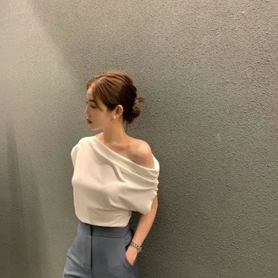 2025 Shirts for Women White Diagonal Collar Crop Tops Off Shoulder Short Sleeve Tshirt Lady Korean Wild OL Pleated T-shirts