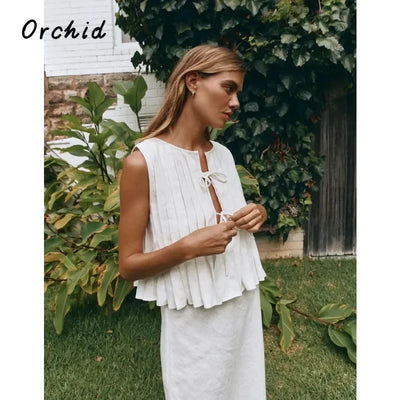 Fashion Bow Lace Up Shirts Women Cotton Linen Hollow Out Sleeveless Pleated Blouses Woman 2025 Summer New Casual Lady White Tops