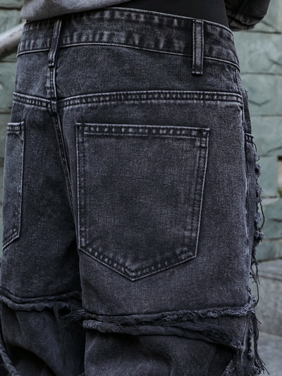 Men's black jeans. With a design of (ripped holes) and tassels. In a street trend style.