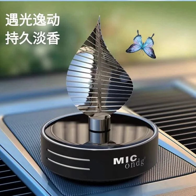Car aromatherapy perfume car premium sense of niche rotating solar car gold leaf aromatherapy net red perfume new