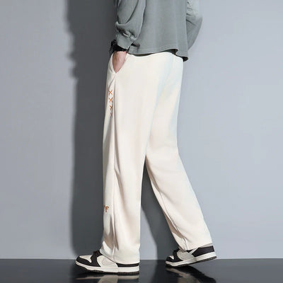 Contemporary Men's Fashion Trousers Loose Silhouette Trendy Drawstring Detail Suited for a Variety of Occasions Comfort