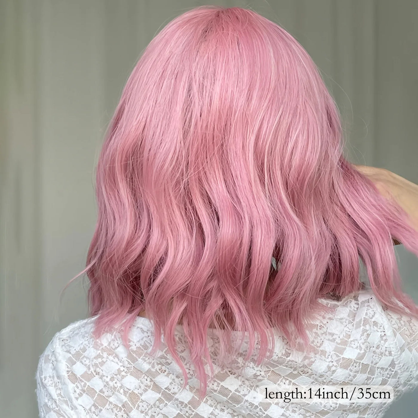 A fashionable 14-inch short curly pink wig with bangs for women - elegant wavy body style, heat-resistant synthetic hair, ideal