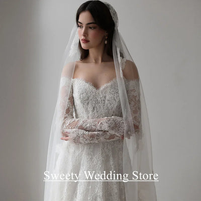 Saudi Arabia Wedding Dress Customized Sweetheart Full Sleeves Pearls Lace Bridal Gown Sweep Train Arabian Bride Dresses