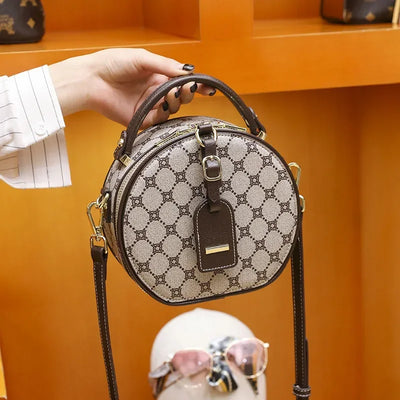 Elegant Handbag For Women In Genuine Leather, Crossbody And Shoulder Bag With Chic Detailing, By Famous Luxury Designer