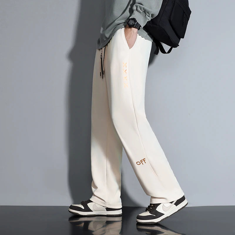 Contemporary Men's Fashion Trousers Loose Silhouette Trendy Drawstring Detail Suited for a Variety of Occasions Comfort