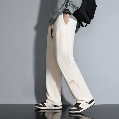 Contemporary Men's Fashion Trousers Loose Silhouette Trendy Drawstring Detail Suited for a Variety of Occasions Comfort