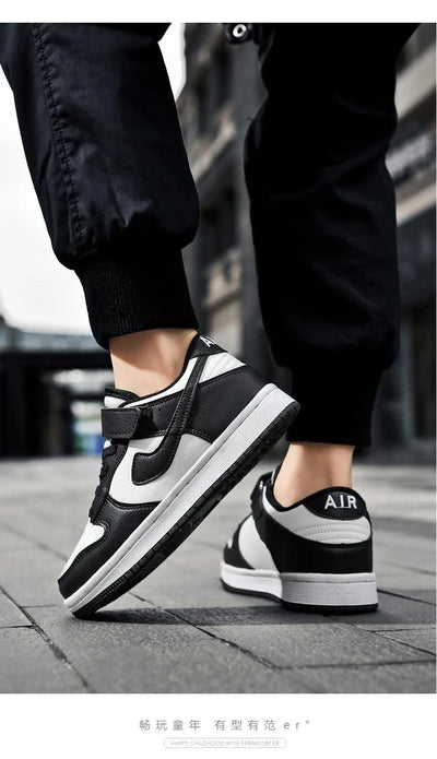 Boys' sports shoes 2025 new leather-covered waterproof children's casual shoes primary school trend non-slip board shoes