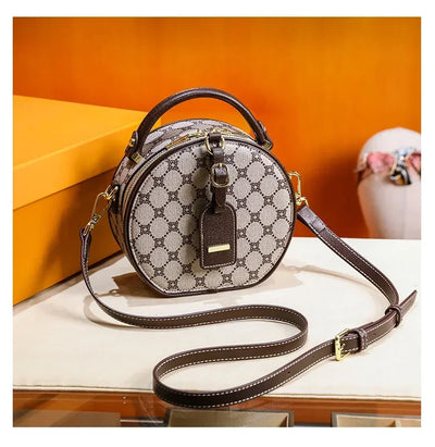 Elegant Handbag For Women In Genuine Leather, Crossbody And Shoulder Bag With Chic Detailing, By Famous Luxury Designer