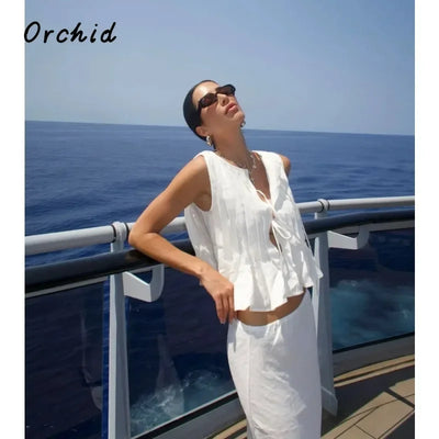 Fashion Bow Lace Up Shirts Women Cotton Linen Hollow Out Sleeveless Pleated Blouses Woman 2025 Summer New Casual Lady White Tops