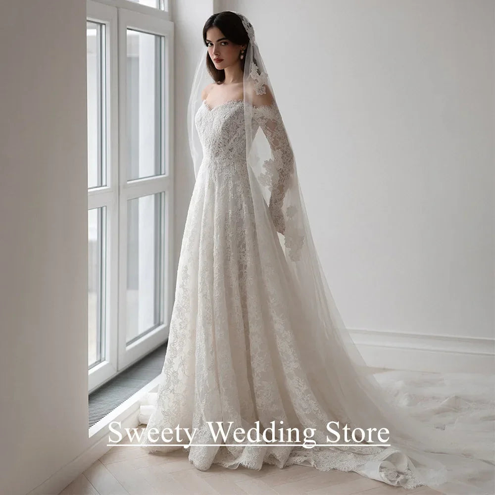 Saudi Arabia Wedding Dress Customized Sweetheart Full Sleeves Pearls Lace Bridal Gown Sweep Train Arabian Bride Dresses
