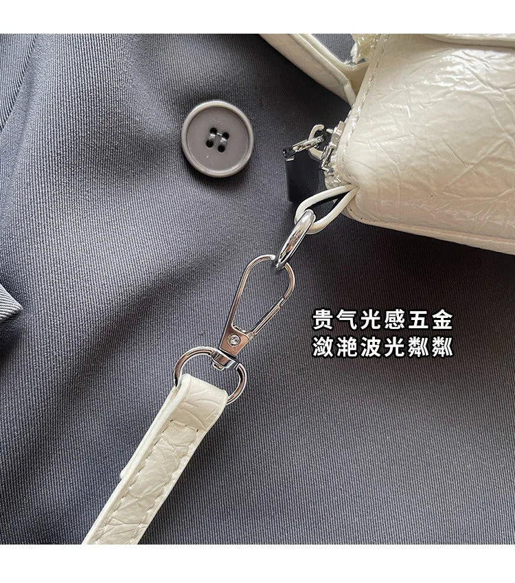 2025 New Designer Hand Carved Shoulder Bag Stylish Textured Crossbody Purse for Women Elegant Handheld Tote Fashionable