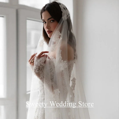 Saudi Arabia Wedding Dress Customized Sweetheart Full Sleeves Pearls Lace Bridal Gown Sweep Train Arabian Bride Dresses